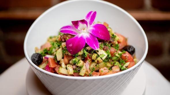 Shepherd Salad · Chopped cucumbers, tomatoes, red onion, and parsley tossed with extra virgin olive oil and vinegar.