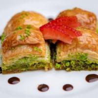 Baklava · Turkish pastry made of many layers of paper-thin dough filled with crushed pistachios.