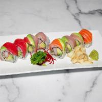 Rainbow Roll (8Pcs) · Crab-stick, cucumber, avocado inside topped with assorted thinly slice raw fish
