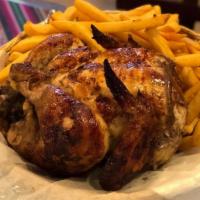 1/2 Pollo · 1/2 rotisserie Chicken served with French fries/Salad or White rice/Salad.