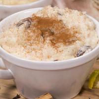 Arroz Con Leche · Rice pudding with raisins, and a pinch of cinnamon.