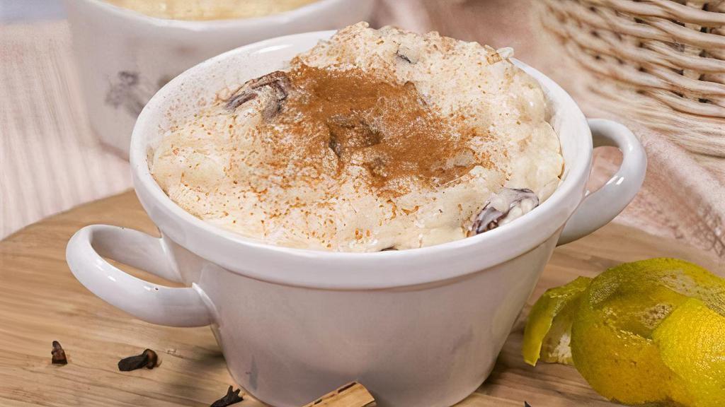 Arroz Con Leche · Rice pudding with raisins, and a pinch of cinnamon.
