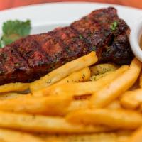 Steak And Fries Plate · Certified Angus beef New York strip steak served with your. choice of sauteed vegetables, fr...