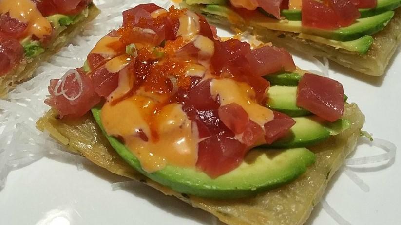 Tuna Pizza · Diced fresh tuna, avocado, scallion on top of homemade scallion pancake drizzled with sweet and spicy sauce.