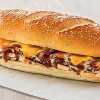 The Cowboy · Grilled chicken and crispy bacon smothered in BBQ sauce with melted cheddar cheese on a fres...