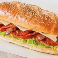 Dibella'S Blt · A mountain of crispy bacon with lettuce, tomato, onion, mayonnaise and American cheese on a ...