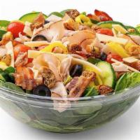 Turkey Club Salad · Turkey, bacon, grape tomatoes, cucumbers, banana peppers & black olives with choice of dress...
