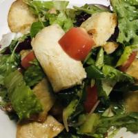 Betsy · Grilled and tossed with romaine, mesclun, tomatoes, red onions and potatoes, Betsy's special...