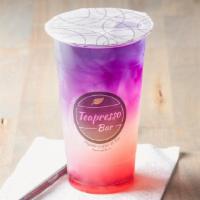 Waikiki Sunset Lemonade · Blueberry, pomegranate, squeeze of mango and yuzu, topped with butterfly pea tea.