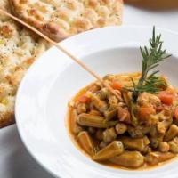 Baby Okra Stew · Baby okra cooked with chickpeas, and tomatoes with
rice or bulgur pilaf