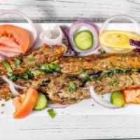 Chicken Shish Kebab · 2 pieces. cooked on a skewer.
