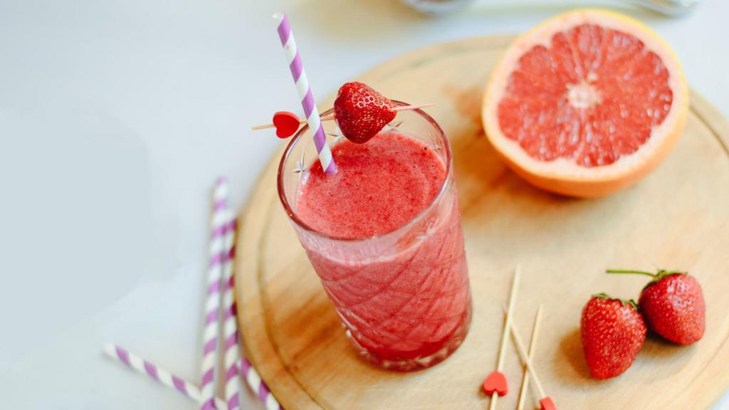 Strawberry & Grapefruit Juice · Freshly juiced strawberry and grapefruit.