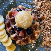 Belgian Waffle · House-baked Belgian waffle, brown butter maple syrup, raw berry. compote, fresh banana, hous...