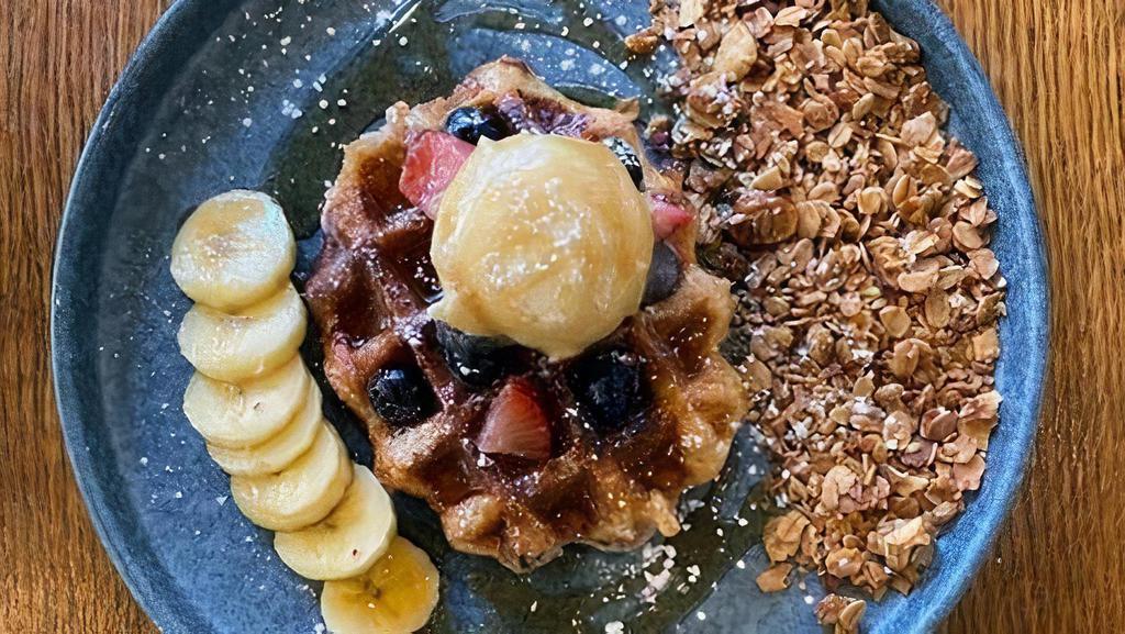 Belgian Waffle · House-baked Belgian waffle, brown butter maple syrup, raw berry. compote, fresh banana, house-made granola and mascarpone