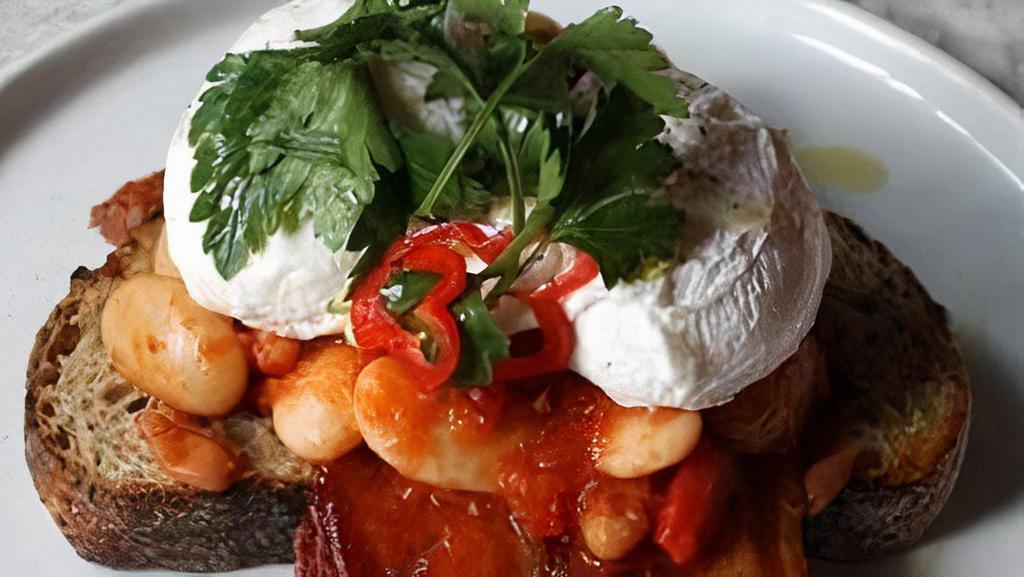 Rustic Chorizo Baked Beans On Toast · Gigante & chorizo baked beans, 2 poached eggs and bacon on  multi grain toast