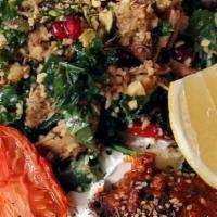 Harissa Chicken Bowl · Grilled Harissa chicken, couscous, roasted vegetables, pomegranate, kale, herbs, medjool dat...