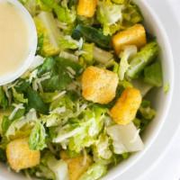 Caesar Salad · Romaine lettuce, caesar dressing, croutons and grated parmesan cheese and parmigiano-reggiano.