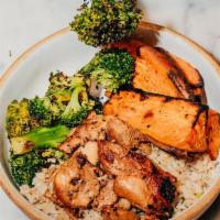 Classic Dig Bowl · Charred chicken, roasted sweet potatoes, charred broccoli with lemon, brown rice, garlic aio...