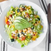 Chopped Salad · Gluten-free. Romaine and baby gem lettuce chopped, chickpeas, avocado, tomato, charred corn,...