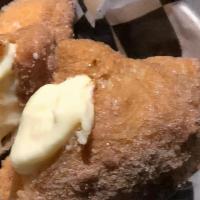 Bomboloni · Three Italian donuts, filled with fresh Bavarian cream.