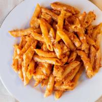 Penne Alla Vodka · Our famous vodka sauce tossed with penne pasta