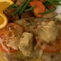 Delicato · Veal scaloppine sauteed with artichokes, slice tomatoes & topped with asiago in a white wine...