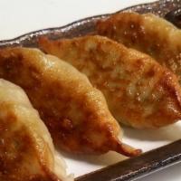 Mandoo · Pork or veggie. Five pieces pan-fried dumplings with ponzu.