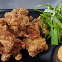 Pa Dak · Lightly coated fried boneless dark meat chicken served with scallion and spicy mayo.