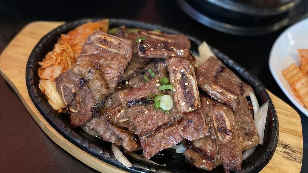 Galbi Lunch Special · Grilled short rib with onion and kimchi with rice.