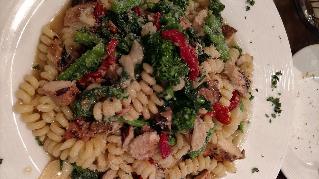 Fusilli Fantasia · Grilled chicken, broccoli rabe and sun-dried tomatoes sautéed in a garlic and olive oil brodino tossed with imported gorgonzola cheese.