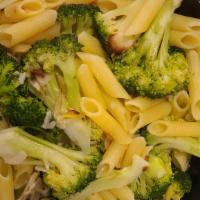 Penne Broccoli · Fresh broccoli florets and fresh diced tomatoes in a lite garlic and olive oil brodino.