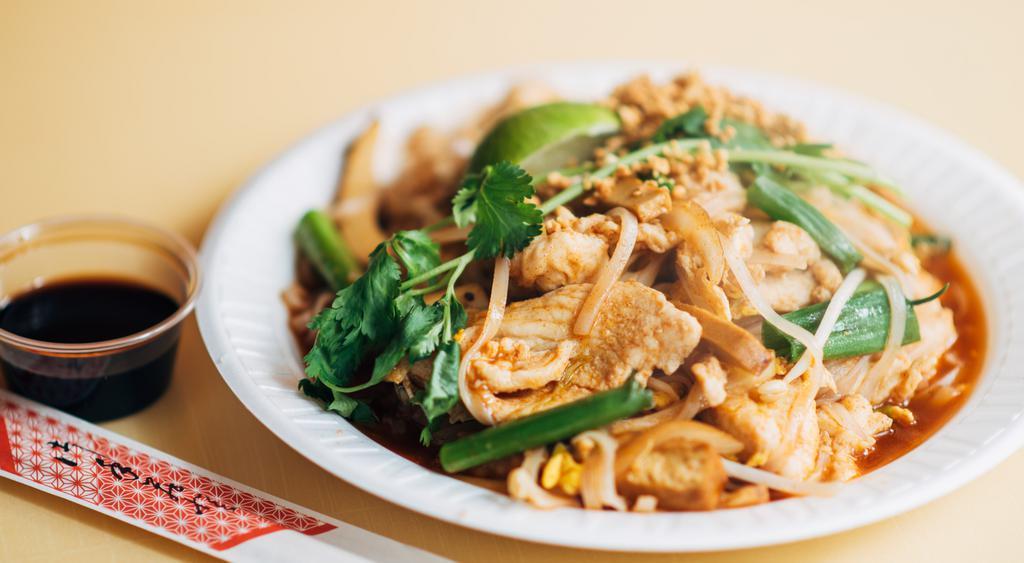 Pad Thai · Famous Thai sautéed rice noodles with sautéed eggs, scallion, tofu bean sprouts, and ground peanuts.
