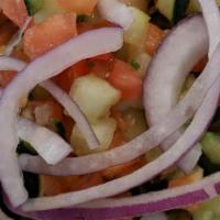 Authentic Israeli Salad · Finely Chopped Lettuce, Cucumber, Tomato, Red Pepper, Onion, Parsley & Mint, Served with Fal...