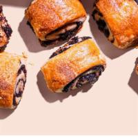 Rugelach · PART PASTRY AND PART COOKIE
Satiny soft dough wrapped around a filling of melted cocoa or ra...
