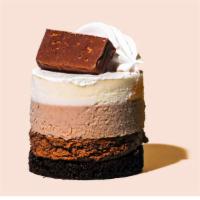 Triple Chocolate Mousse · This triple layer cake is the trifecta of chocolate deliciousness. The bottom layer is a lig...