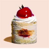 Strawberry Shortcake · Delicious layers of dense, buttery and moist vanilla short cake filled with fresh whipped va...