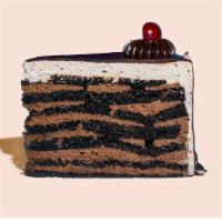 Seven Layer · Chocolate Cake with 7 layers of smooth chocolate filling, 7 layers of moist & rich choco...