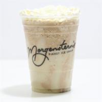Vietnamese Coffee Rum Shake · Vietnamese Coffee Rum ice cream blended with milk and topped with whipped cream.