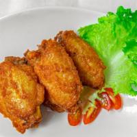 S6 Spring Crispy Chicken Wings (5) · Spicy. Hot and spicy. Fried chicken wing with homemade spicy sauce.