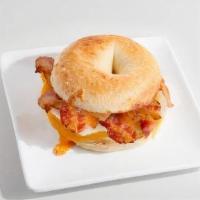 Bagel Breakfast Sandwich · A delicious hot breakfast sandwich served on a New York toasted bagel with egg, cheddar chee...