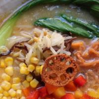 Vegan Miso Ramen · Vegan. Umami rich miso, mushroom broth, and wavy flour noodles, topped with a colorful array...