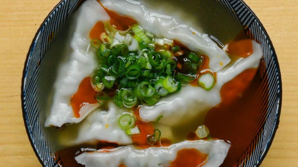 Boiled Gyoza (5Pc) · Gyoza dumpling in the chicken soup with spicy oil and scallions.