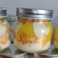 Lemon Mousse Cake Jars · Lemon cake cubes, lemon mousse, lemon curd, and citrus cookie crumble