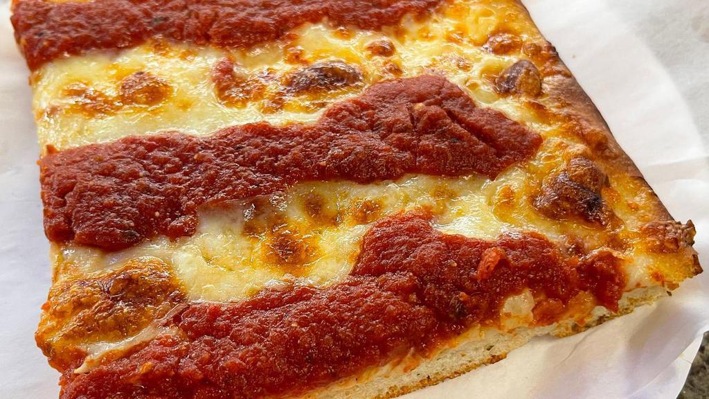 Classic Cheese Focaccia Slice · Mozzarella and tomato sauce.