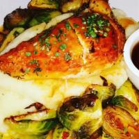 Pan Seared  Chicken · Spiced honey chicken breast, pom puree, roasted brussel sprouts with applewood bacon.