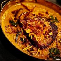 Kholapuri Machli ( New Item) · Seabass cooked in Maharashtrian Spices, fresh curry leaves, yellow curry.