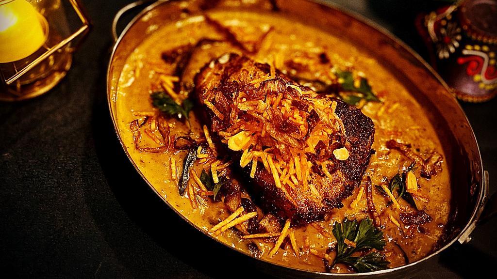 Kholapuri Machli ( New Item) · Seabass cooked in Maharashtrian Spices, fresh curry leaves, yellow curry.