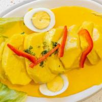 Papa A La Huancaina · boiled yellow potatoes (similar to the Yukon Gold potatoes) in a spicy, creamy sauce called ...