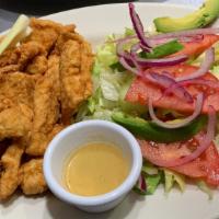 Chicharron De Pescado · Pieces of Fish Fillet(Tilapia) Fried till Crispy.