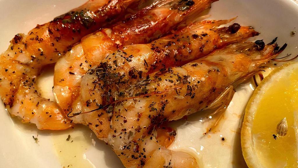 Grilled Shrimp (5Pcs) · simply grilled shrimps (head on), lemon oil, oregano